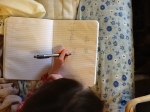 Here she's working it out on paper the way they taught her.